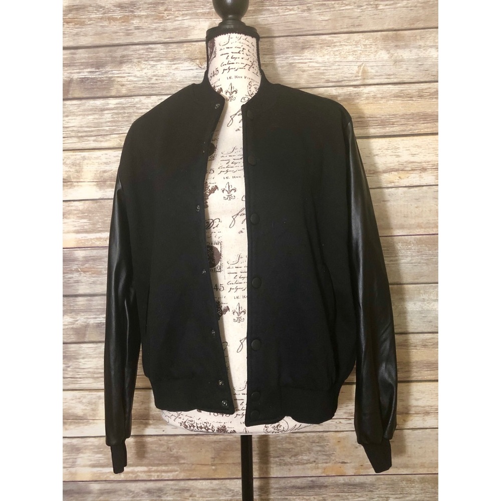 Black jacket with leather sleeves